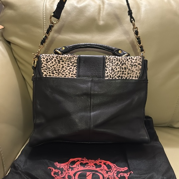 Kelsi Dagger animal print leather purse. - Picture 3 of 9